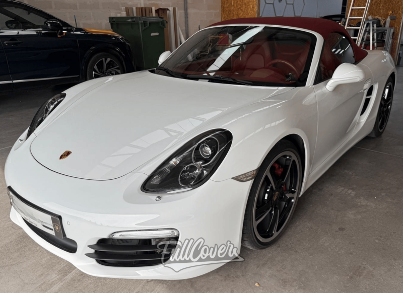 Pose de film de protection carrosserie PPF sur face avant et bas de caisse de Porsche Boxster près de Saint-Pryvé-Saint-Mesmin