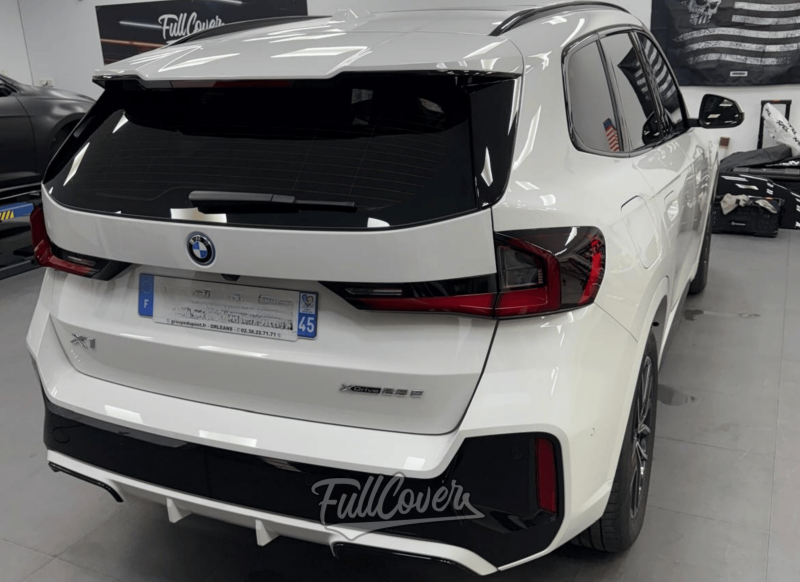 Pose de vitres teintées sur le 3/4 arrière de BMW X1 près de Saint-Pryvé-Saint-Mesmin