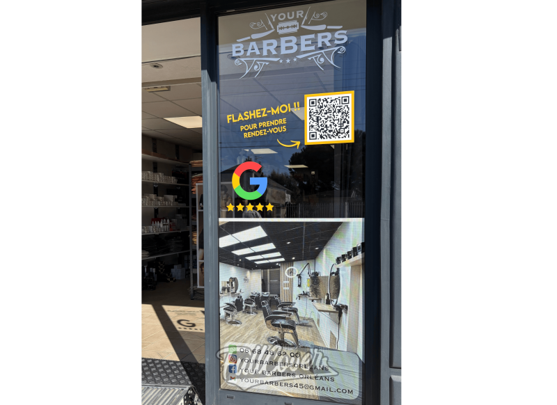 Pose de vitrophanie micro-perforée sur vitrines de commerce pour marquage publicitaire de Your Barbers à Orléans