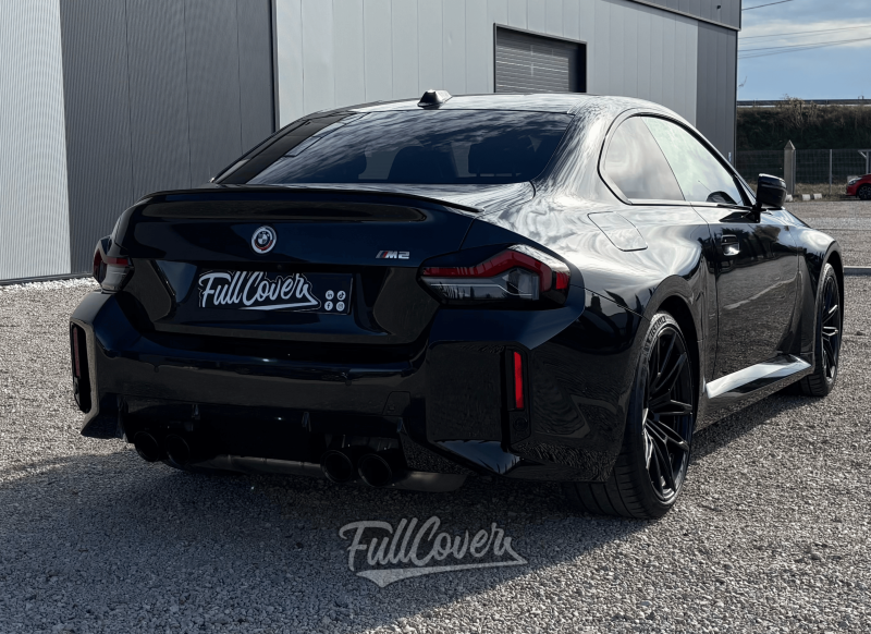 Pose complète de PPF sur BMW M2 noire brillante à Orléans