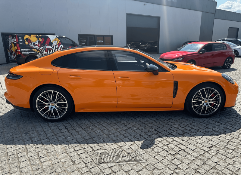 Covering total orange éclatant sur Porsche Panamera : transformation audacieuse et stylée à Orléans