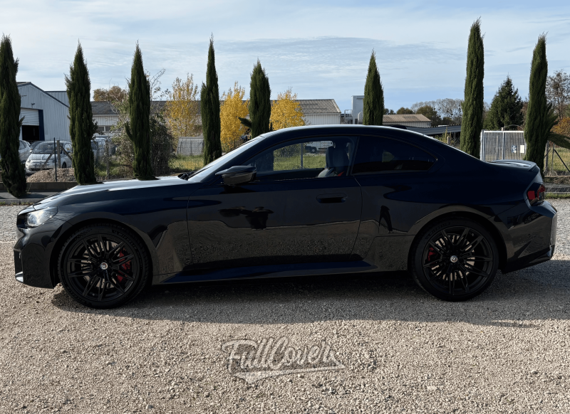 Pose complète de PPF sur BMW M2 noire brillante à Orléans