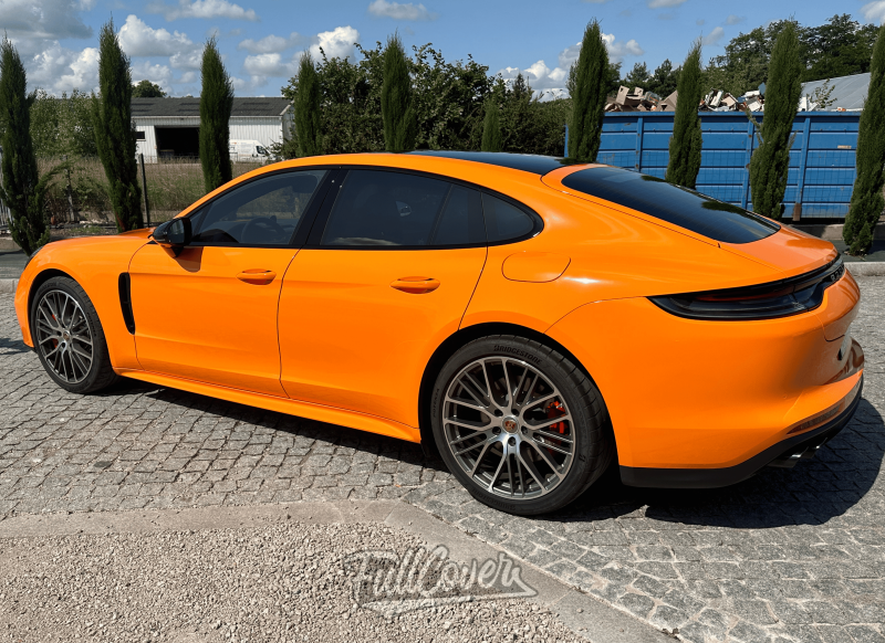 Covering total orange éclatant sur Porsche Panamera : transformation audacieuse et stylée à Orléans